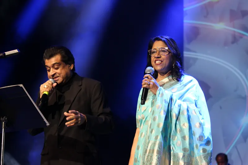 Two vocalists sharing the stage