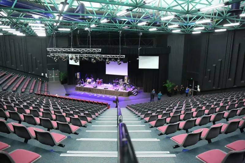 Venue and lit stage before the audience arrives