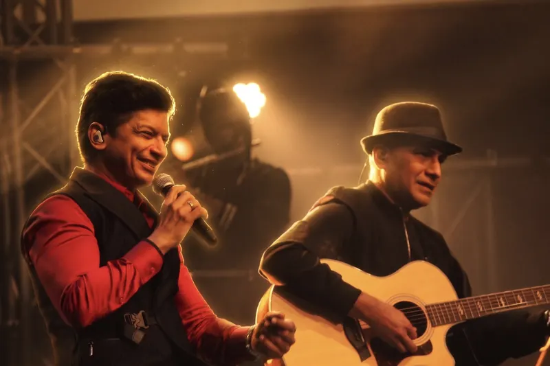 Singer and acoustic guitarist performing together